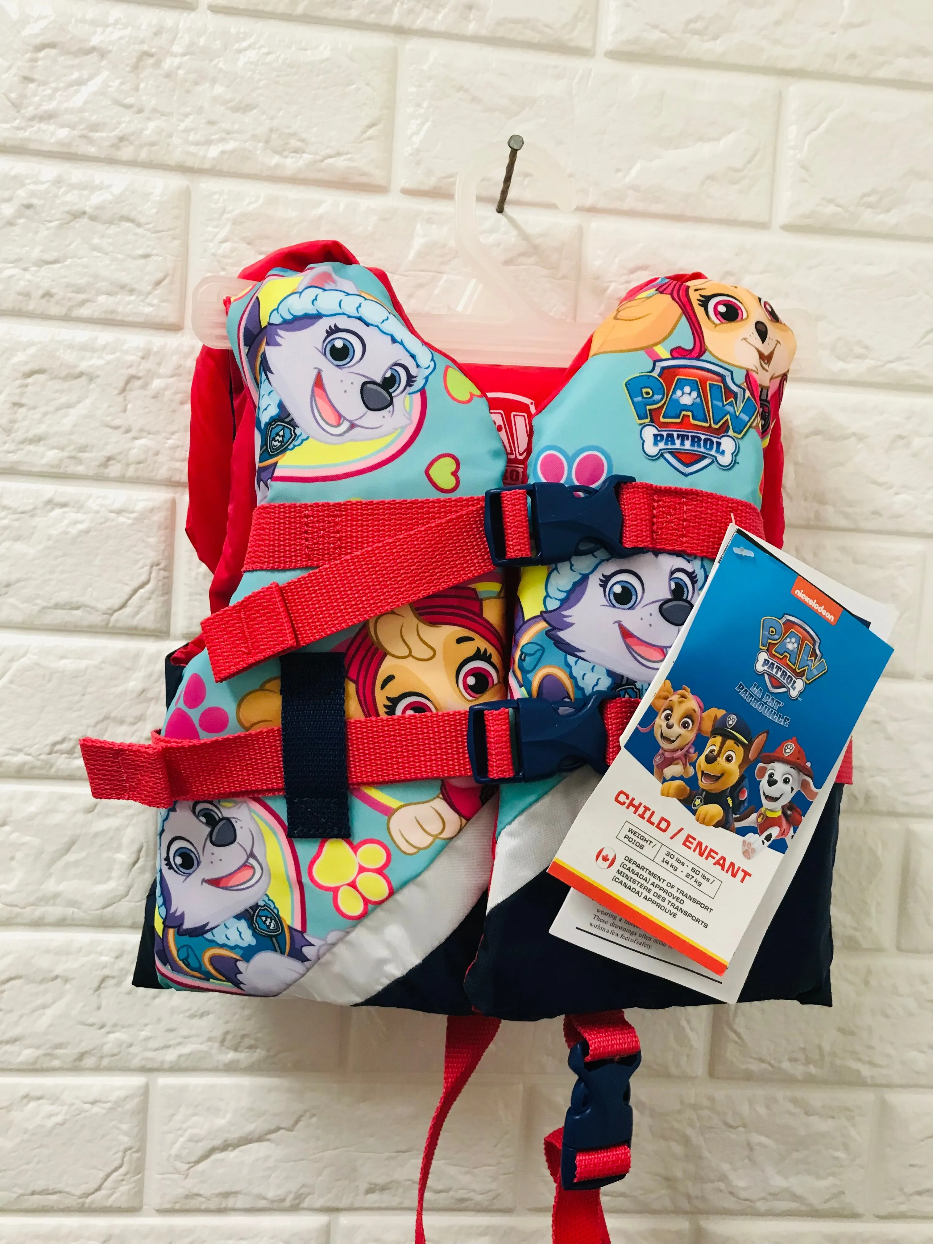 New with tags! PAW Patrol Child Pfd - GIRLS! 30-60 Lbs, with an extra contoured float above the neck—like a pillow—to encourage face-up flotation